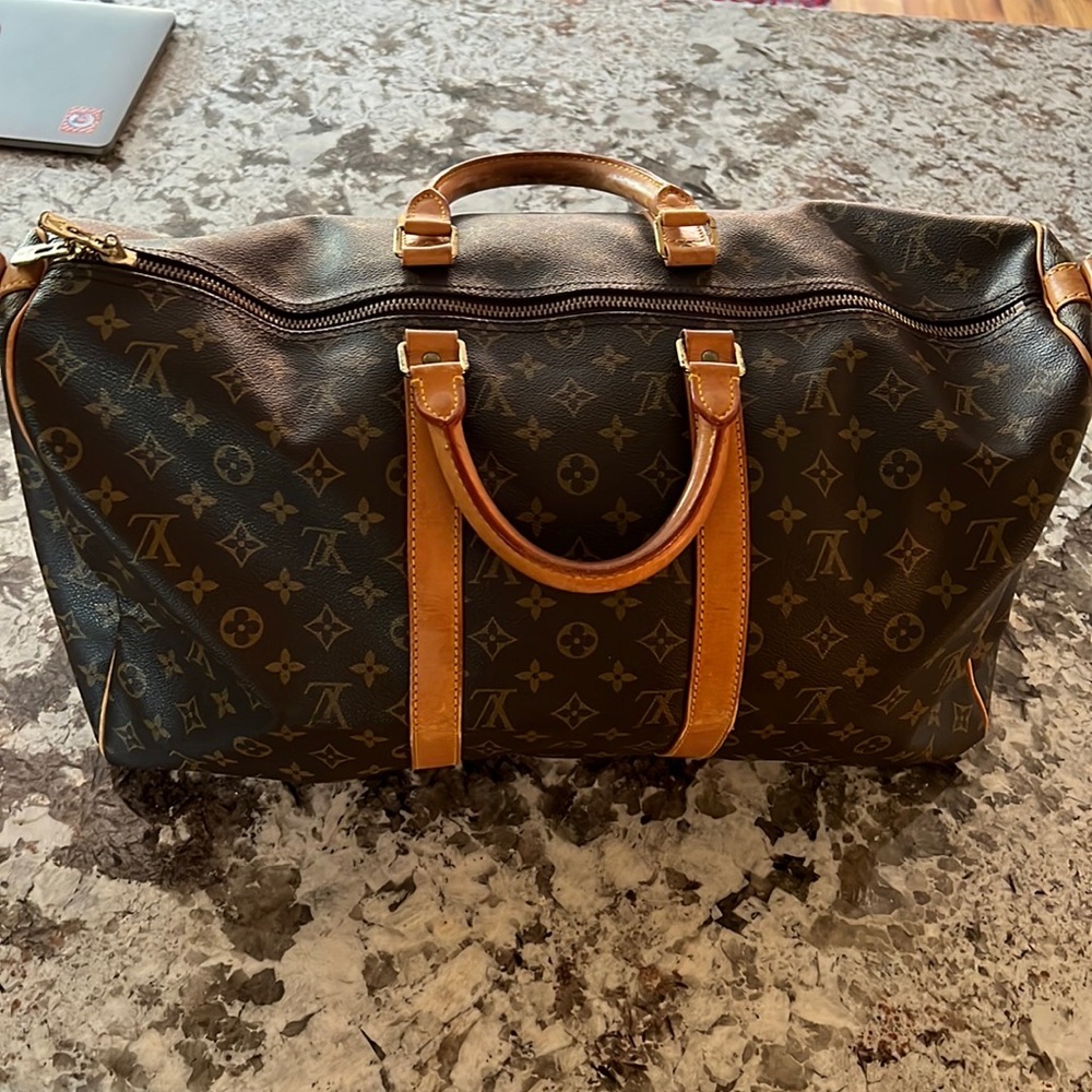 Verified Authentic vintage (Jan1990) Louis Vuitton Keepall 50 in Monogram Canvas